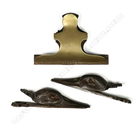 A near pair of French cast metal figural duck's head paper clasps,