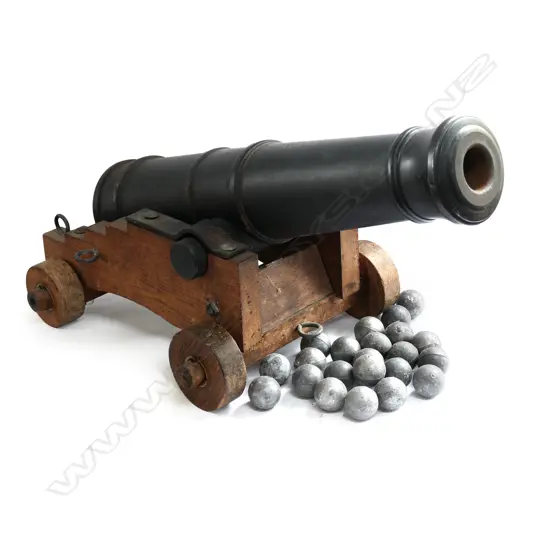 A replica muzzle loading black powder fireable deck cannon