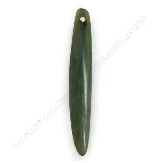 A Māori pre-European pounamu pendant, kuru type, light green tone, slightly curved form, with tapered suspension hole. Translucent with areas of white inclusion. Registered Y16354.