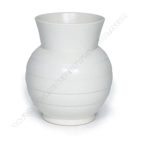 A Crown Lynn 'Hand Potted' vase, shape #24 with lathe banded spherical body and open flared neck, matt white glaze, printed and incised marks to base. H.185mm.