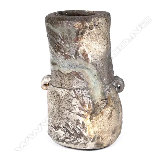 Chester Nealie anagama fired vase, small lug side handles, streaks of grey/green heavy glaze, impressed leaf patterns. Incised potter's marks and with paper label. H.255mm.