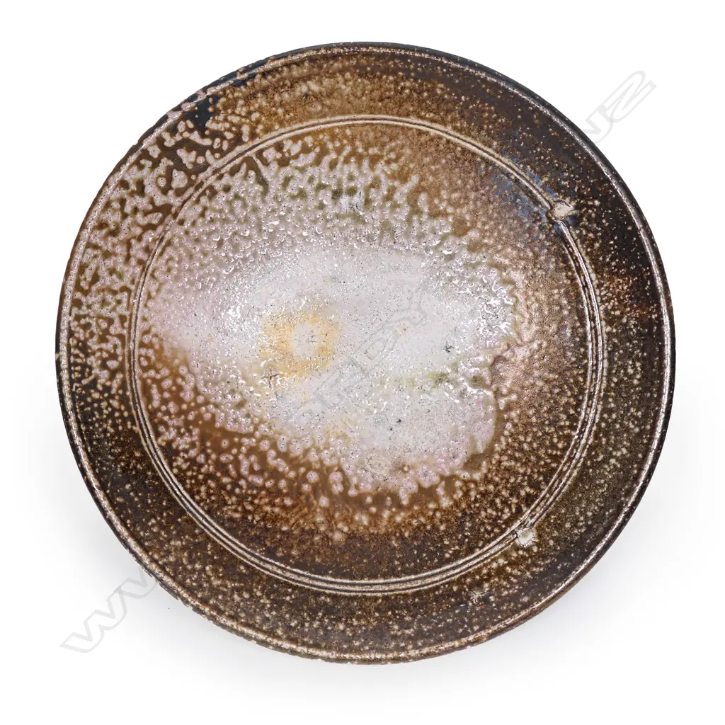 Chester Nealie salt glazed plate, variable dark and pale heavily fired glaze effects. Impressed marks. Dia.273mm. Image 1++