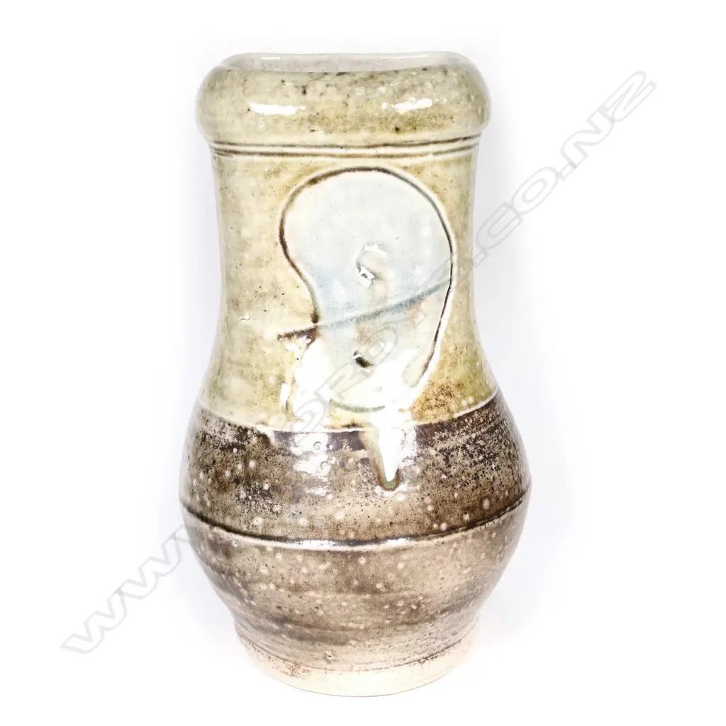 Denis O'Connor porcelain salt glazed vase, incised peanut motif to the tall rectangular neck, two-tone tan and brown ground. Impressed potters mark. H.235mm. Image 1++