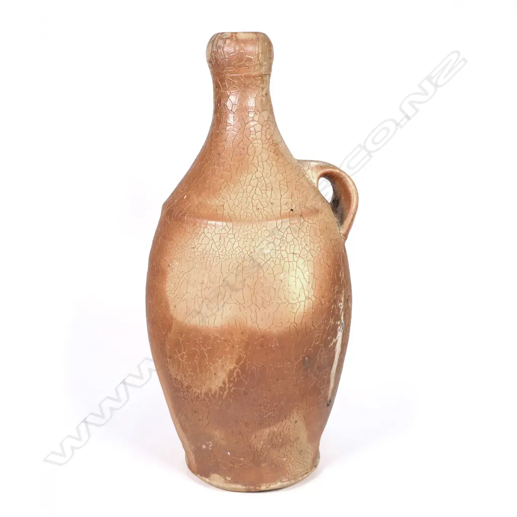 Duncan Shearer tall anagama fired bottle, fired at the ASP (Auckland Society of Potter's) kiln, one side with heavy glazed effects, wide lug handle. Impressed potter's marks. H.225mm. Image 1++