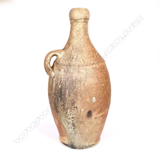 Duncan Shearer tall anagama fired bottle, fired at the ASP (Auckland Society of Potter's) kiln, one side with heavy glazed effects, wide lug handle. Impressed potter's marks. H.225mm.