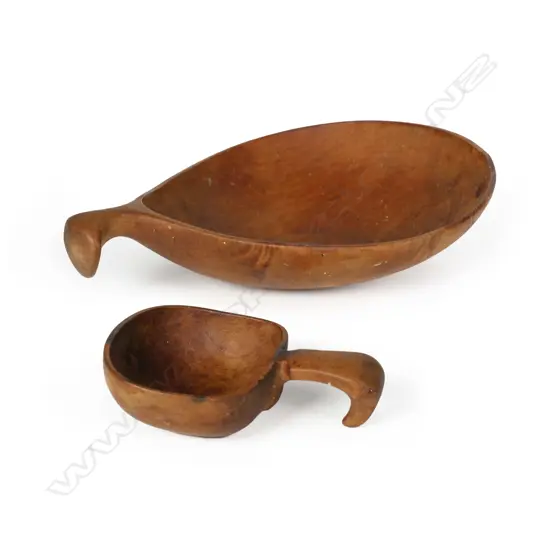 Two Levi Borgstrom carved wooden spoons, one a tea caddy scoop, the other with wide tapered bowl, small crack to rim, both with hook form short handles. Maximum W.105mm.