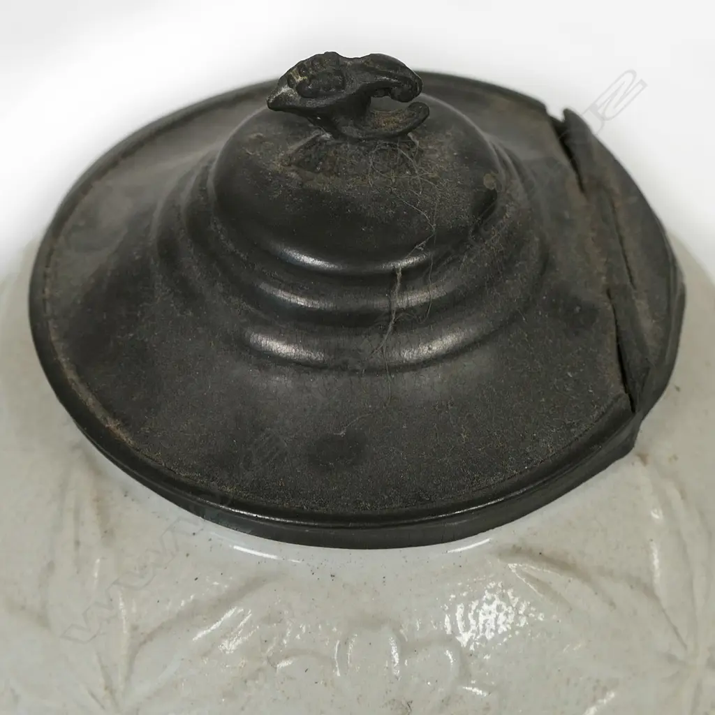 A salt glaze china Victorian period teapot, with pewter mounted cover and decorated with prunus and basket weave. Unmarked. W.230mm Image 1++