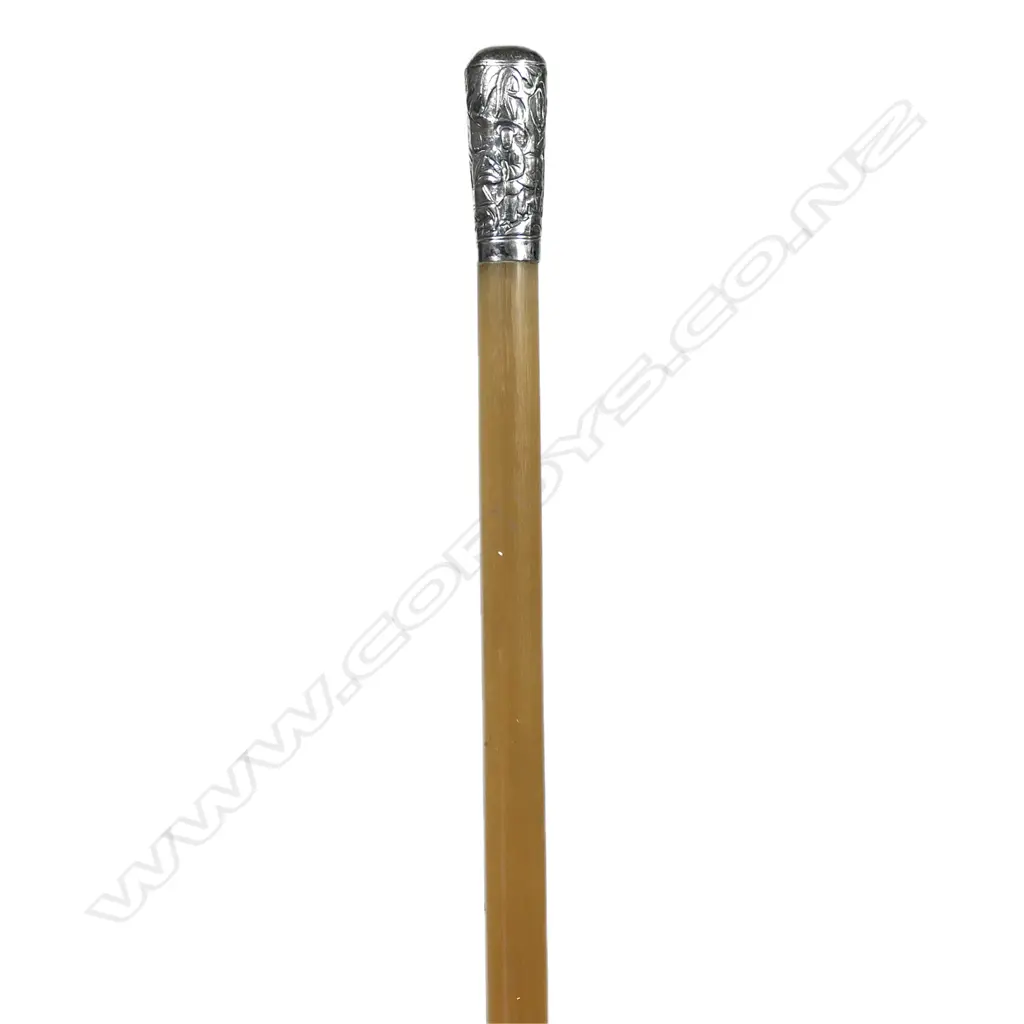 A rare Chinese silver mounted and horn swagger stick, the handled embossed with fingers in a landscape, the mildly tapered horn stick showing semi translucent properties. L.778mm. Image 1++