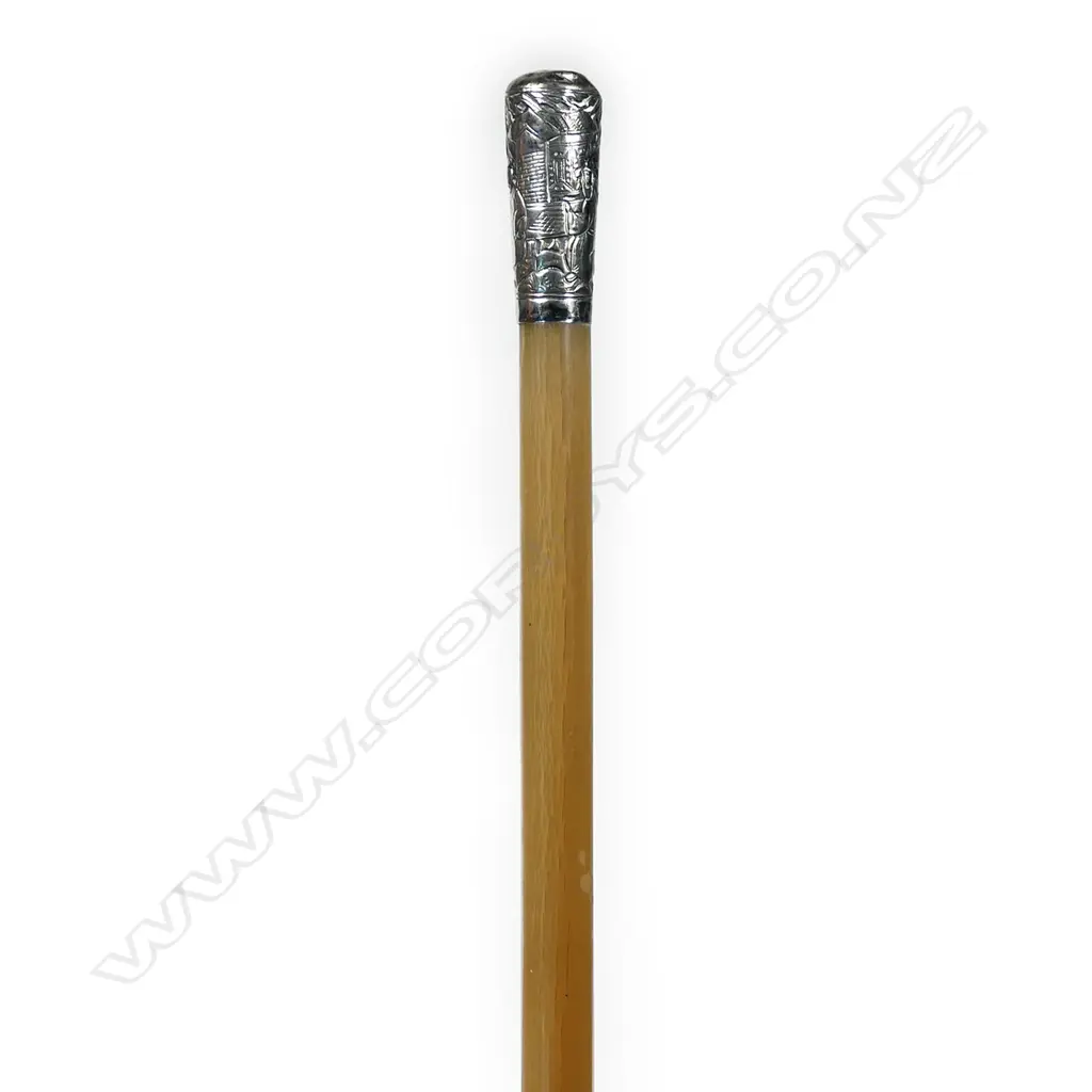 A rare Chinese silver mounted and horn swagger stick, the handled embossed with fingers in a landscape, the mildly tapered horn stick showing semi translucent properties. L.778mm. Image 1++