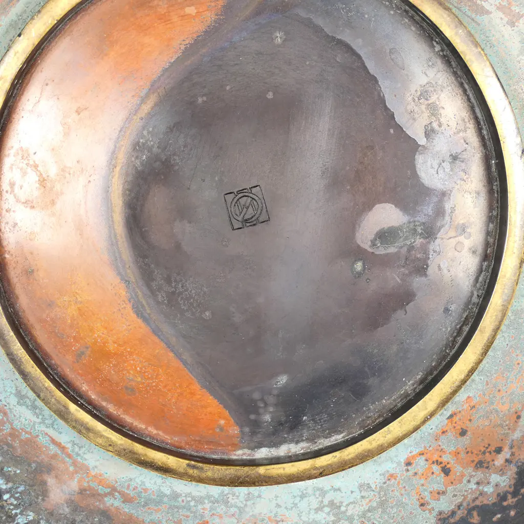 A Japanese Meiji period mixed metals plate, depicting a night-time cormorant fisher. Patination required. Engraved trademark for Nogawa workshops, Kyoto. Dia.305mm Image 1++