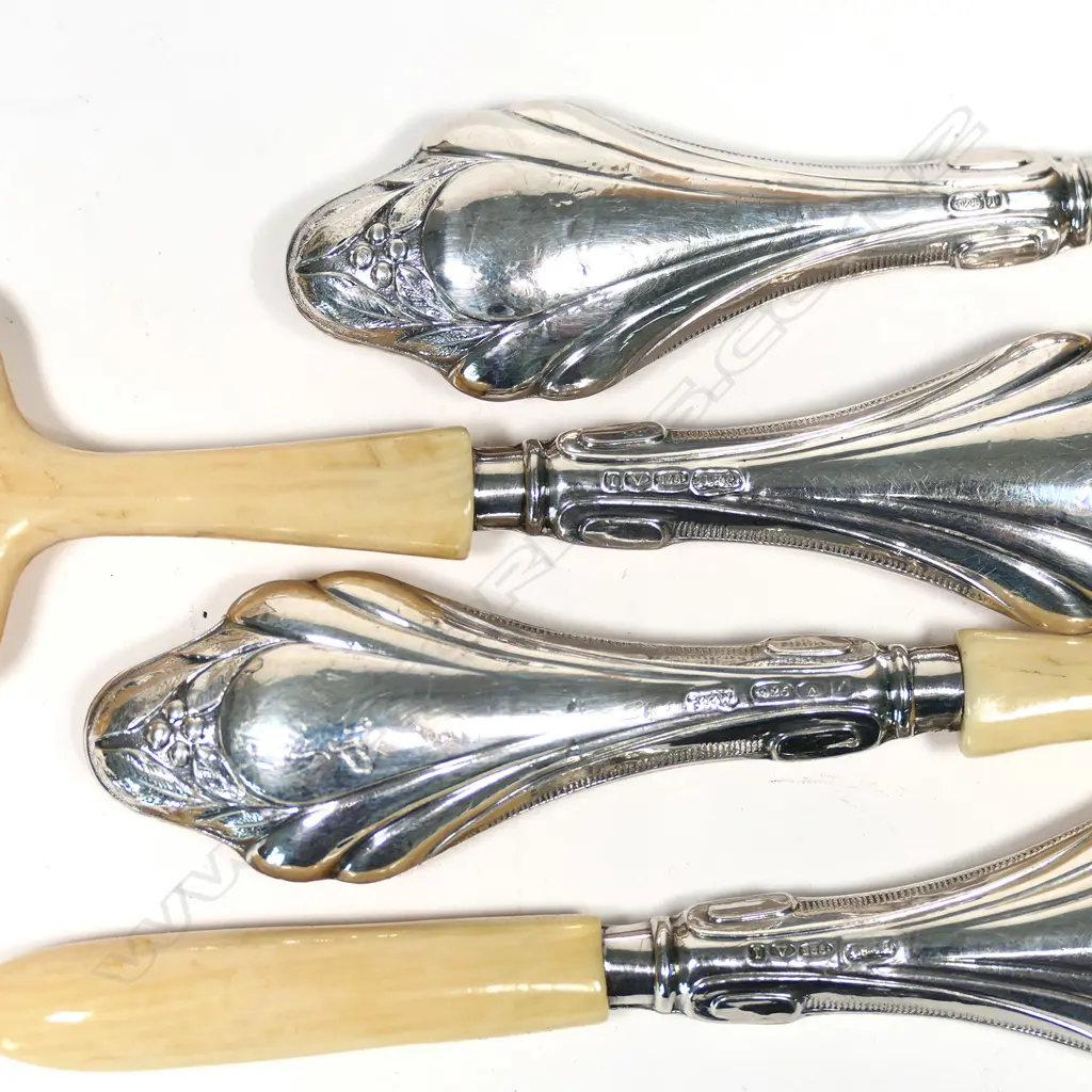 A cased set of four .925 silver handled reflexology implements, the faux ivory tools with Art Nouveau handles. Image 1++