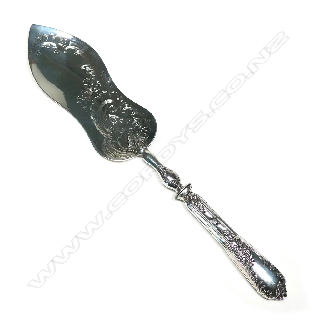 A French silver patisserie serving slice, with hourglass blade with engraved decoration on short hourglass stem and neo-classical decorated handle. Maker's mark for Henry Lapeyre, Paris 1895-1923, L.320mm Image 1++