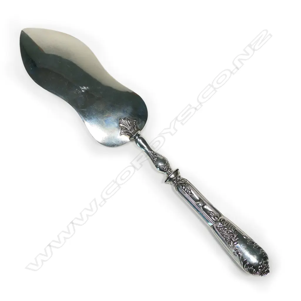 A French silver patisserie serving slice, with hourglass blade with engraved decoration on short hourglass stem and neo-classical decorated handle. Maker's mark for Henry Lapeyre, Paris 1895-1923, L.320mm Image 1++