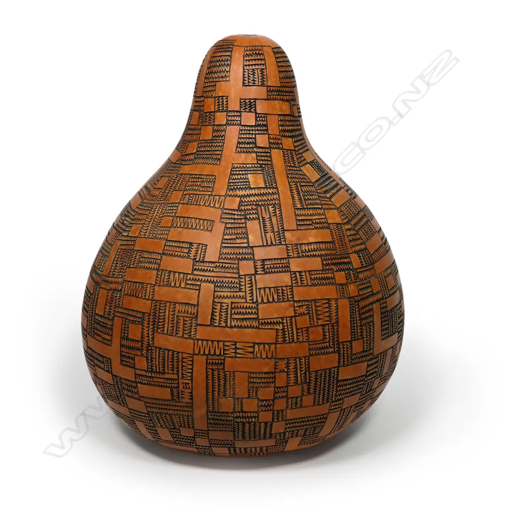 A Theo Schoon carved ovoid gourd, signed, 400 x 300 x 300mm Image 1++