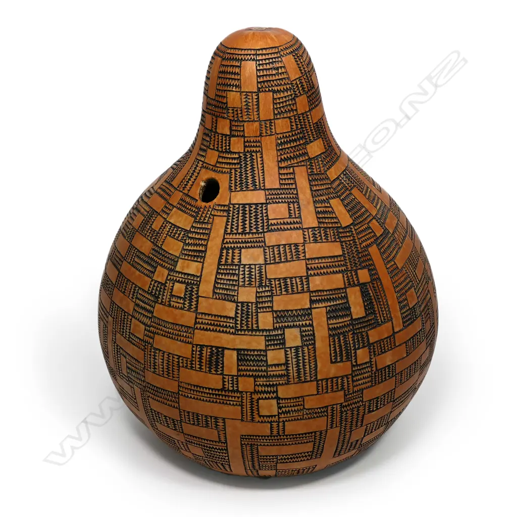 A Theo Schoon carved ovoid gourd, signed, 400 x 300 x 300mm Image 1++