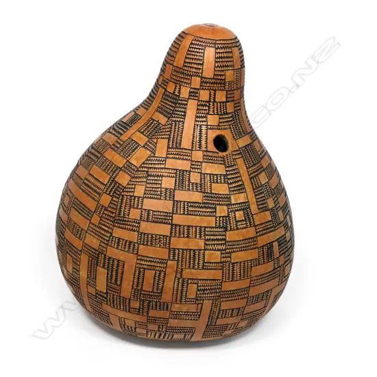 A Theo Schoon carved ovoid gourd, signed, 400 x 300 x 300mm