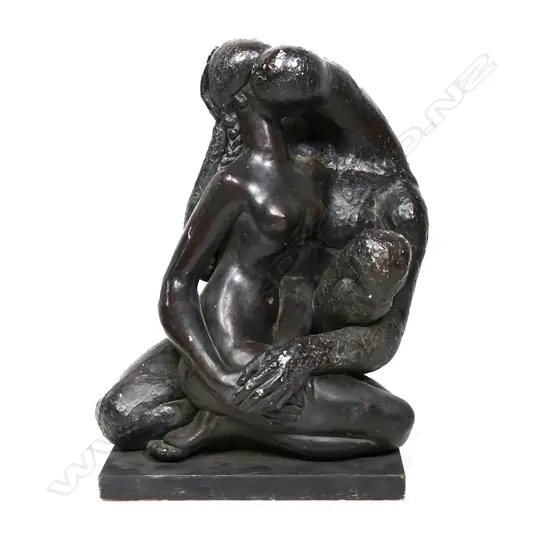 A large composite/plaster sculpture of an embracing couple, the male with textured finish, his companion smooth. H. 740mm.