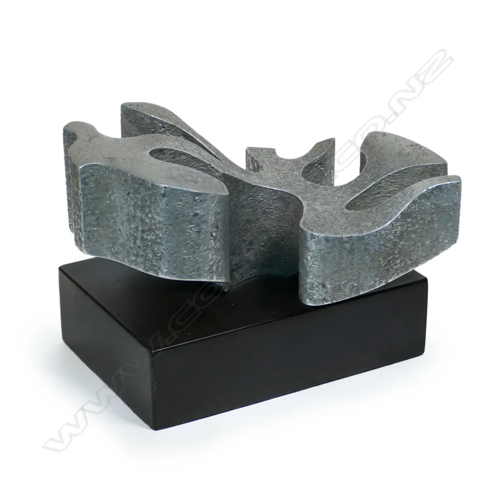 Guy Ngan (1926-2017), sculpture No.2 from the Habitation series 1975, aluminium on ebonised base, impressed artist's name and '2/1975', 175 x 145 x 125mm. Provenance: From the estate of the artist. Exhibited: The Dowse, Guy Ngan: Habitation. 18th May - 15th September 2019. Dunedin Public Art Gallery, Guy Ngan: Habitation. 20th March - 1st July 2021. The Dowse notes: Guy Ngan: Habitation considers how notions of place and belonging influenced his expansive practice, which was grounded in his Chinese heritage, his home in Te Moana nui a Kiwa (the Pacific), and his studies across Aotearoa New Zealand, the United Kingdom and Italy. Image 1++