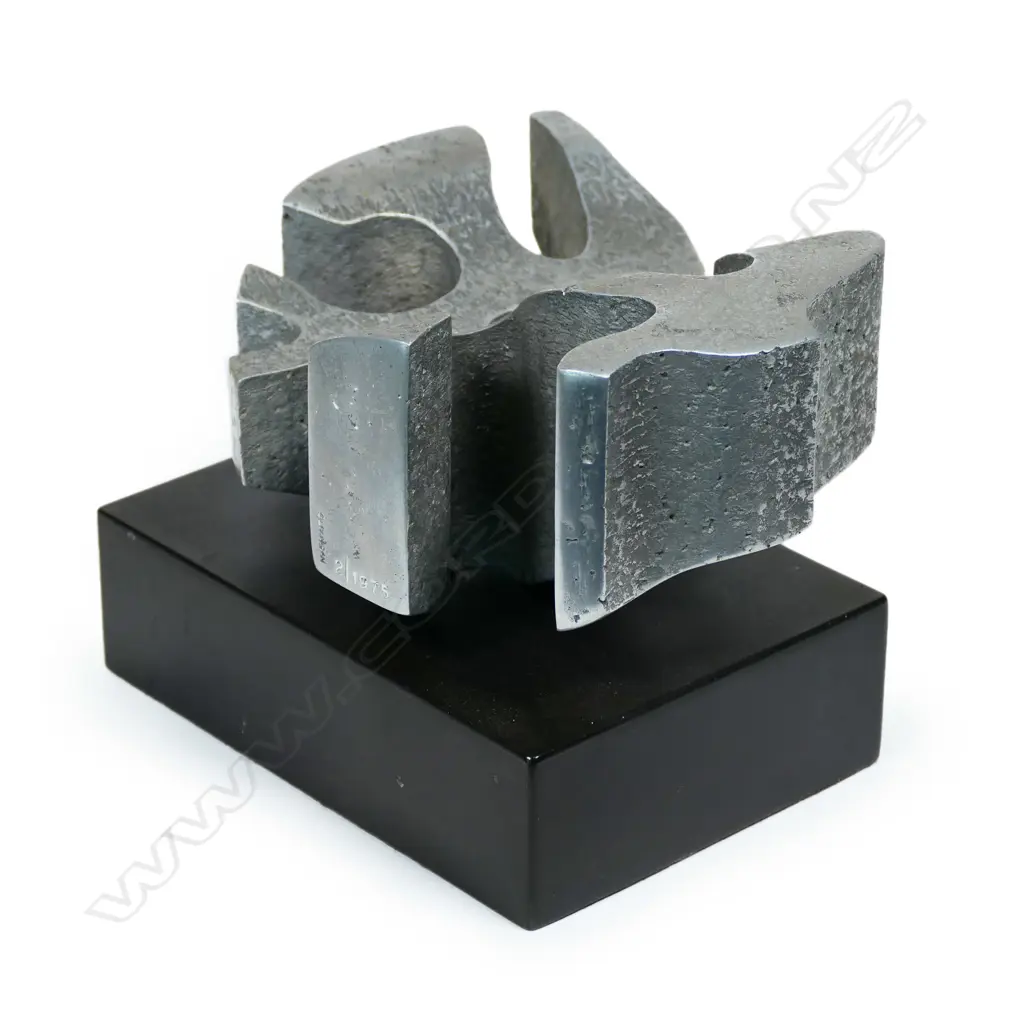 Guy Ngan (1926-2017), sculpture No.2 from the Habitation series 1975, aluminium on ebonised base, impressed artist's name and '2/1975', 175 x 145 x 125mm. Provenance: From the estate of the artist. Exhibited: The Dowse, Guy Ngan: Habitation. 18th May - 15th September 2019. Dunedin Public Art Gallery, Guy Ngan: Habitation. 20th March - 1st July 2021. The Dowse notes: Guy Ngan: Habitation considers how notions of place and belonging influenced his expansive practice, which was grounded in his Chinese heritage, his home in Te Moana nui a Kiwa (the Pacific), and his studies across Aotearoa New Zealand, the United Kingdom and Italy. Image 1++