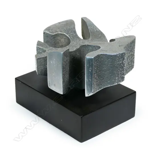 Guy Ngan (1926-2017), sculpture No.2 from the Habitation series 1975, aluminium on ebonised base, impressed artist's name and '2/1975', 175 x 145 x 125mm. Provenance: From the estate of the artist. Exhibited: The Dowse, Guy Ngan: Habitation. 18th May - 15th September 2019. Dunedin Public Art Gallery, Guy Ngan: Habitation. 20th March - 1st July 2021. The Dowse notes: Guy Ngan: Habitation considers how notions of place and belonging influenced his expansive practice, which was grounded in his Chinese heritage, his home in Te Moana nui a Kiwa (the Pacific), and his studies across Aotearoa New Zealand, the United Kingdom and Italy.