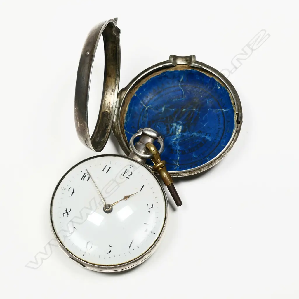 A George III silver pair cased pocket watch, the white enamel dial with Arabic numerals, the fancy back plate engraved 'Goldsmith Liverpool', the case Birmingham 1815 by William Ryley, a noted case maker, the outer pair case Birmingham 1813 with multiple watch papers Image 1++