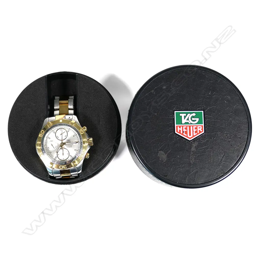 A Tag Heuer 'Aquaracer' gent's chronograph watch, ref. CAF2120, stainless steel and gold-plated case/bezel and bracelet, automatic movement, 300 meters. Original box and papers. Image 1++