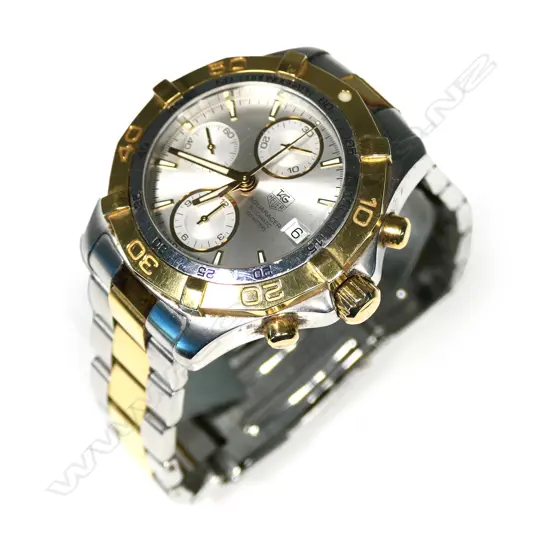 A Tag Heuer 'Aquaracer' gent's chronograph watch, ref. CAF2120, stainless steel and gold-plated case/bezel and bracelet, automatic movement, 300 meters. Original box and papers.