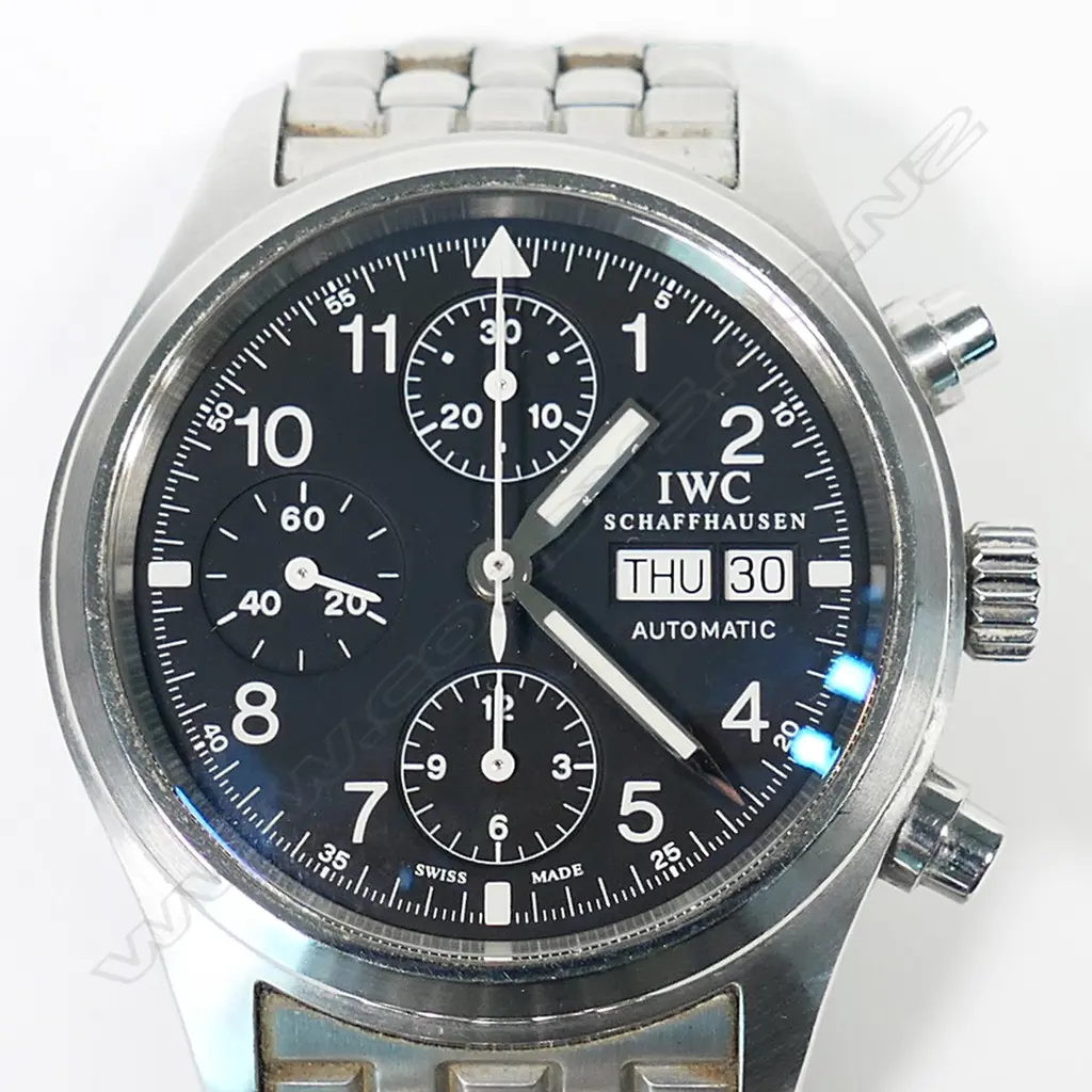 An IWC Schaffhausen Fliegerchronograph (Pilot's chronograph), ref. 3706, automatic, stainless steel 39mm case and bracelet, black dial, quickset day/date. Ser. no. 3030897. Apparently working. Provenance: Private Auckland estate collection. Image 1++
