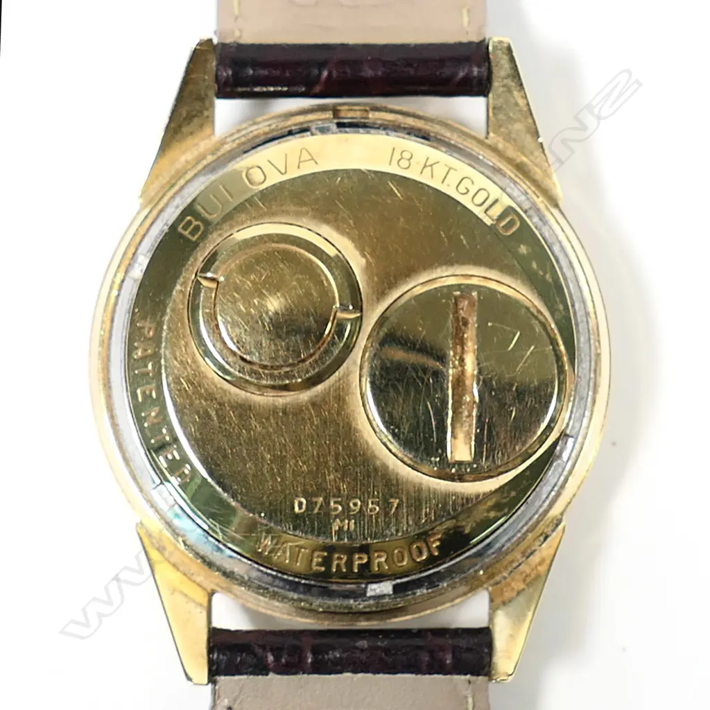 A 1960s Bulova Accutron 18ct gold wristwatch, ref. 214 M1, 34mm case, gold dial with batons indicating hours and railtrack seconds, sweep seconds hand. Signature time setting stem to rear of case. Ser. no. D75957. Not working and requires SR41W battery. Provenance: Private Auckland estate collection. Image 1++