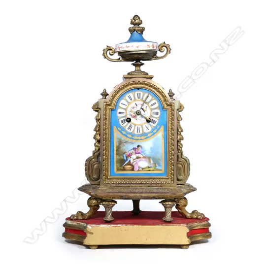 A French 19thC gilt metal and porcelain cased clock, the hand painted face and dial with figures, butterflies and flowers reserved on a bleu celeste ground, surmounted by an urn of conforming decoration. The bell striking 8-day movement stamped 'Japy Freres & Cie'. H.445mm on giltwood plinth. Provenance: The estate collection of Prof. G. Dawson.