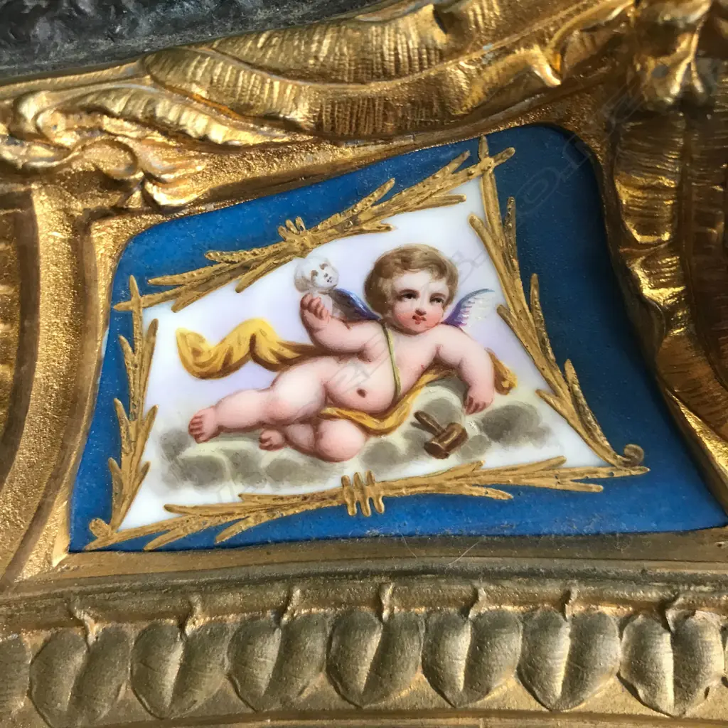 A French 19thC ormolu and bronze mantel clock with Sevres porcelain panels Image 1++