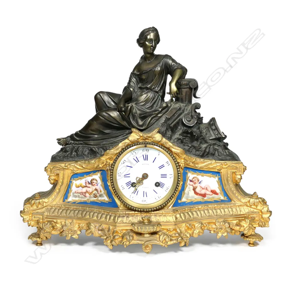 A French 19thC ormolu and bronze mantel clock with Sevres porcelain panels Image 1++