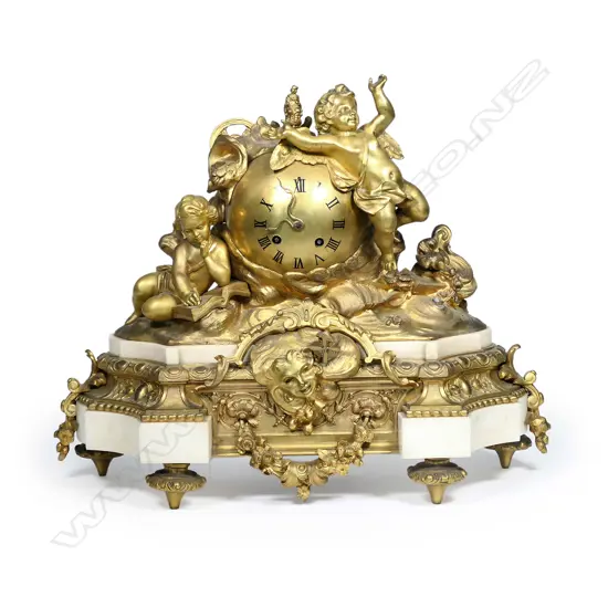 A French 19thC ormolu and white marble mantel clock, the eight-day