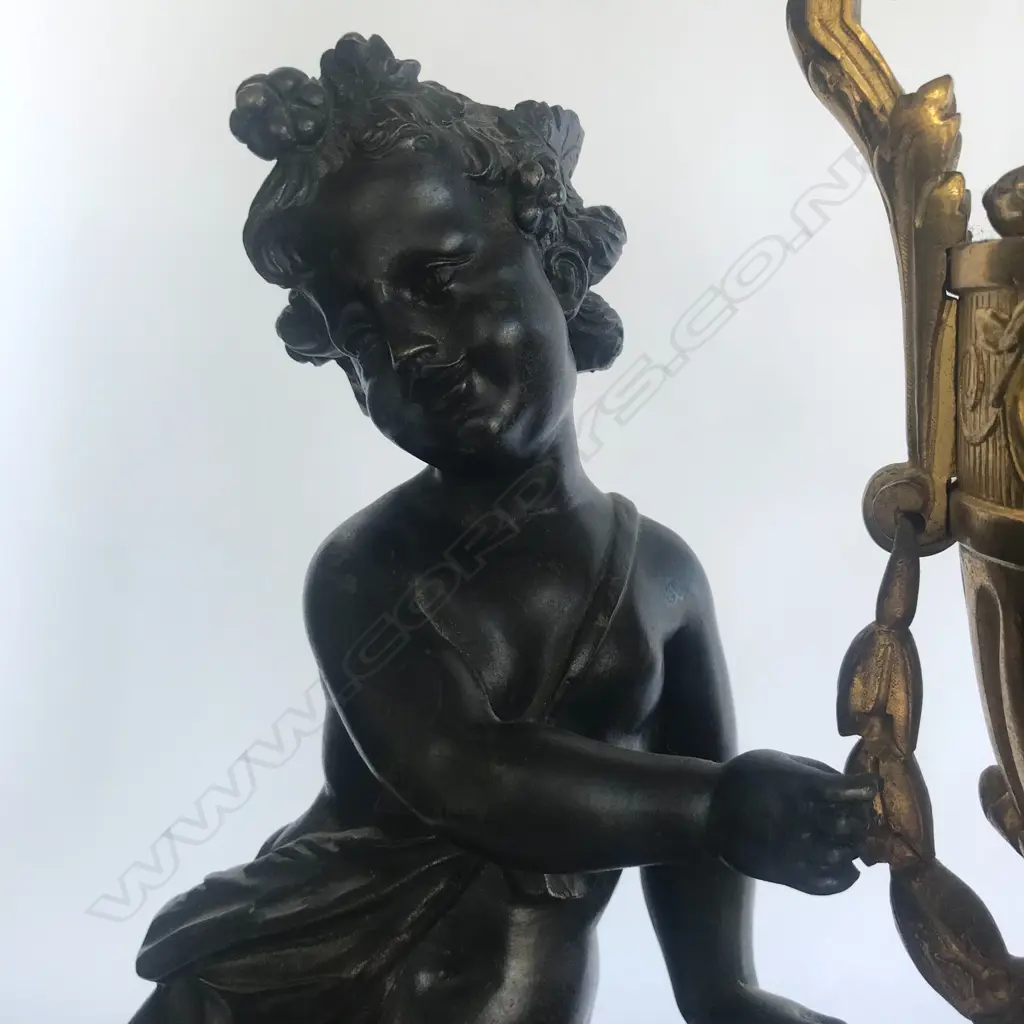 A monumental cased French mantel clock, in ormolu and bronze Image 1++