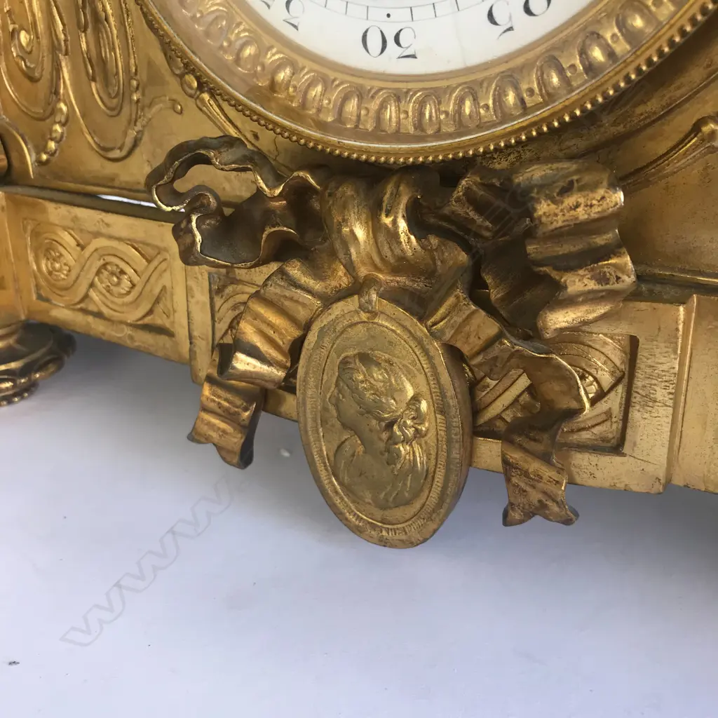 A monumental cased French mantel clock, in ormolu and bronze Image 1++