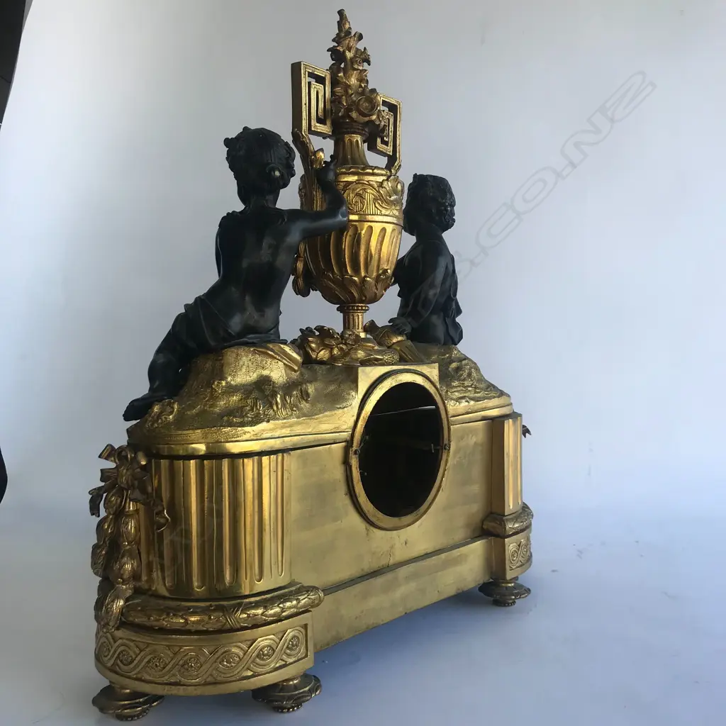A monumental cased French mantel clock, in ormolu and bronze Image 1++