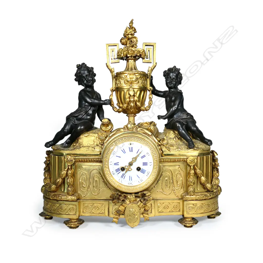 A monumental cased French mantel clock, in ormolu and bronze Image 1++