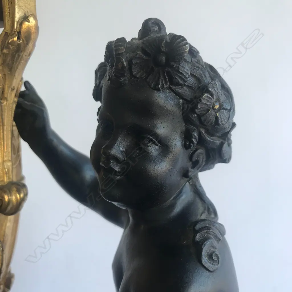 A monumental cased French mantel clock, in ormolu and bronze Image 1++