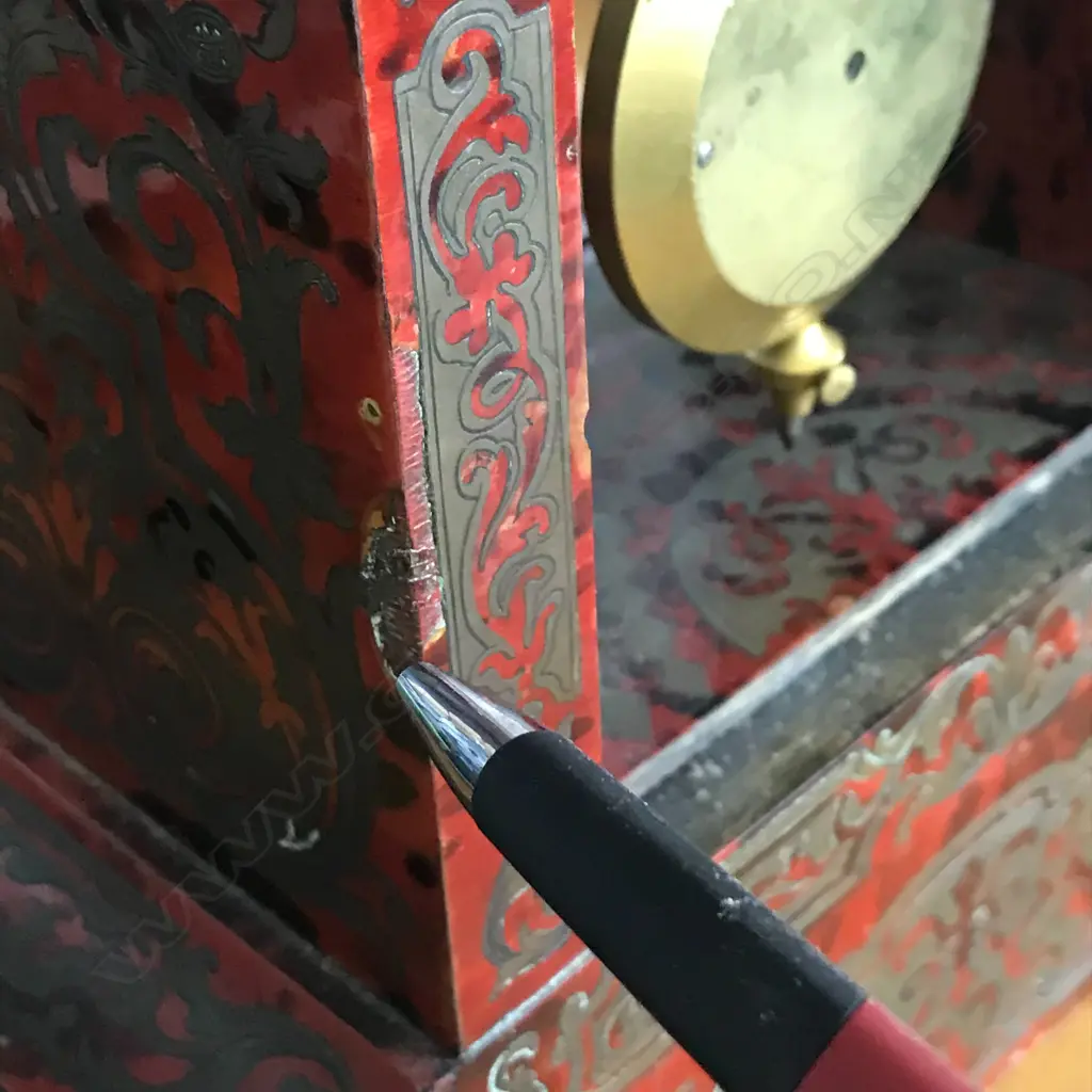 A French 19thC red tortoiseshell lacquer and boulle cut brass inlay mantel clock Image 1++
