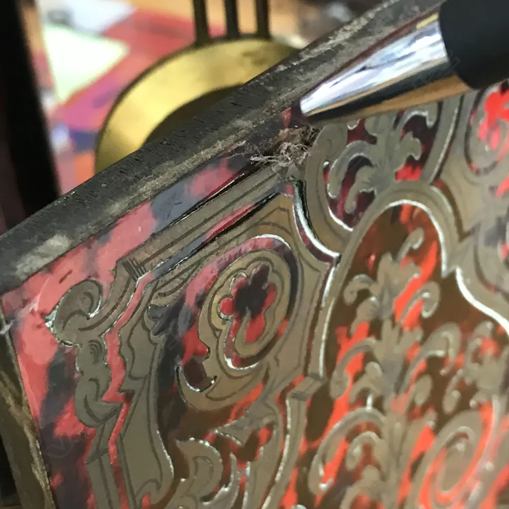 A French 19thC red tortoiseshell lacquer and boulle cut brass inlay mantel clock Image 1++