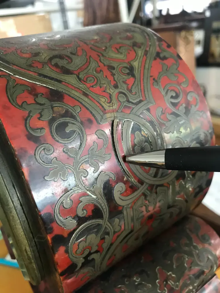 A French 19thC red tortoiseshell lacquer and boulle cut brass inlay mantel clock Image 1++