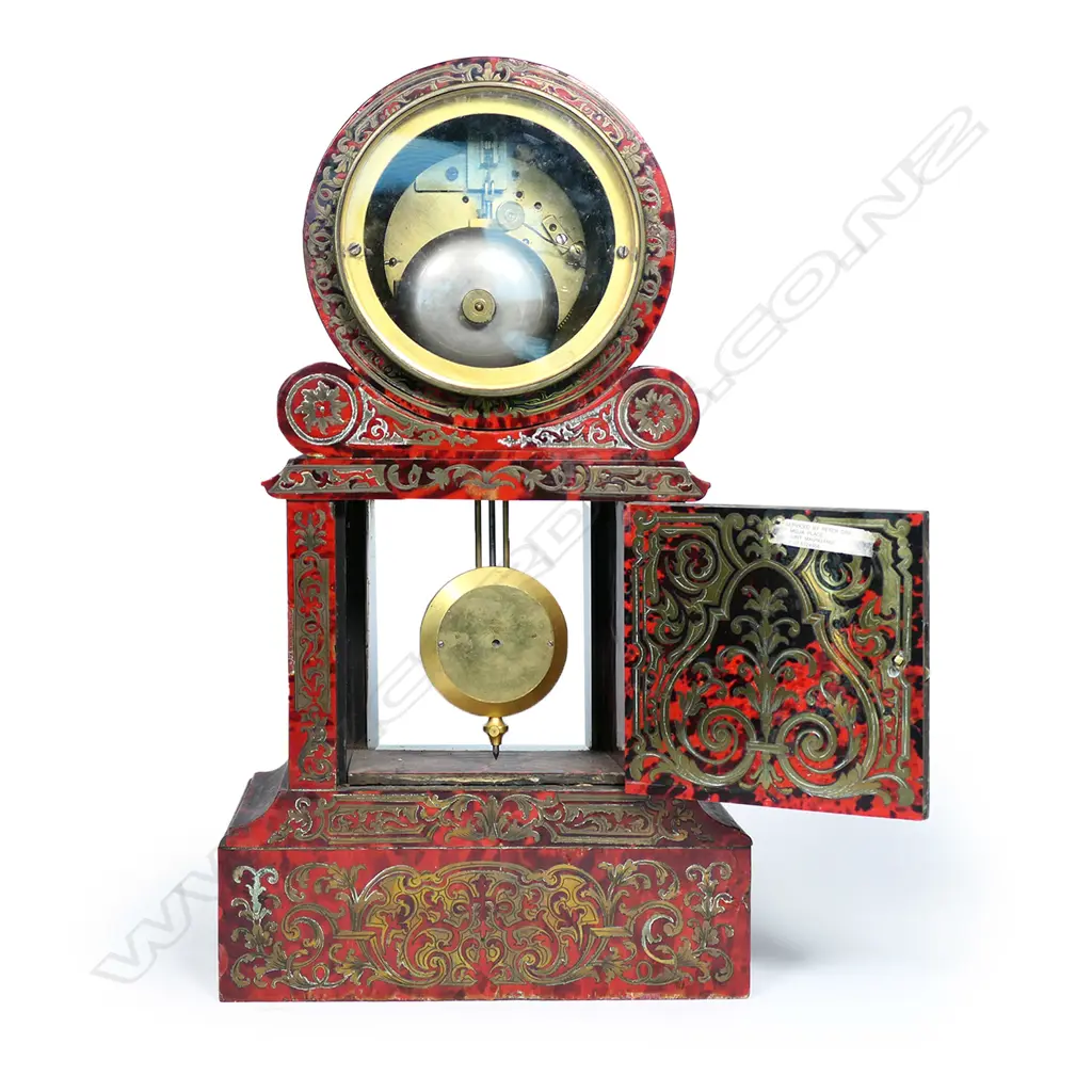 A French 19thC red tortoiseshell lacquer and boulle cut brass inlay mantel clock Image 1++