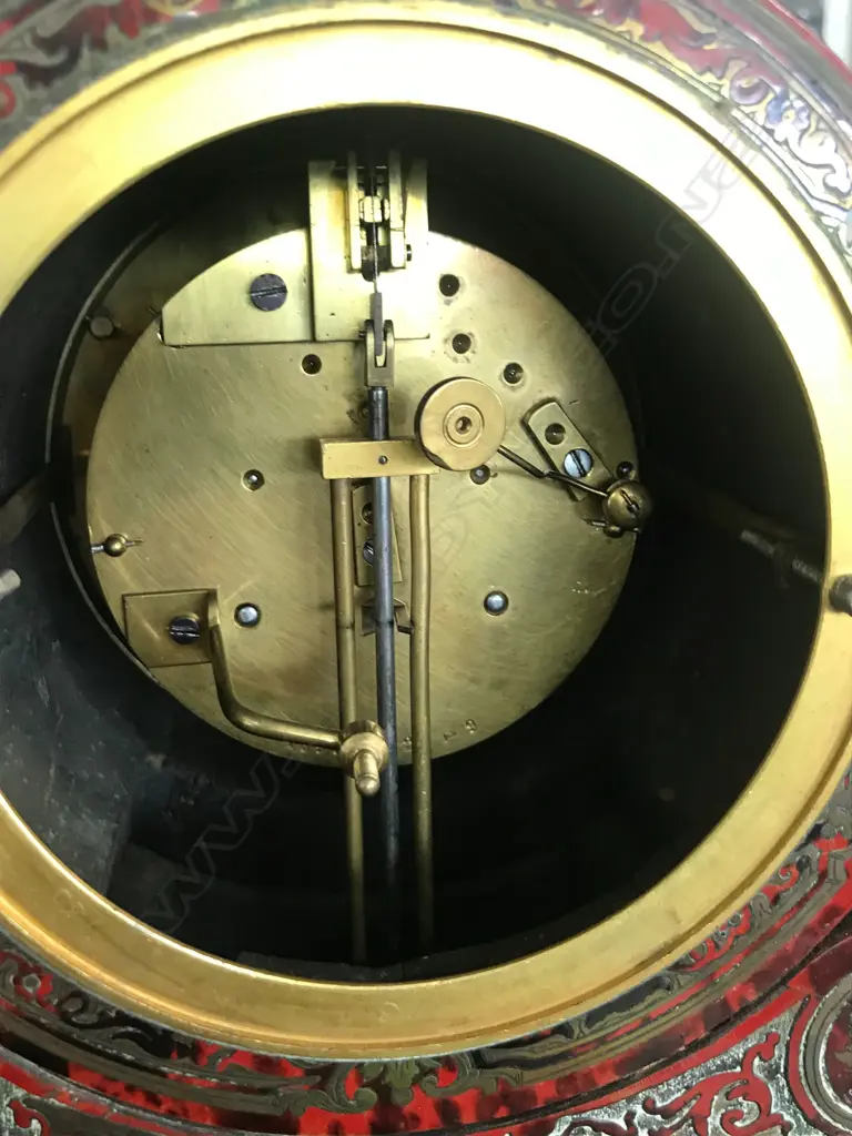 A French 19thC red tortoiseshell lacquer and boulle cut brass inlay mantel clock Image 1++