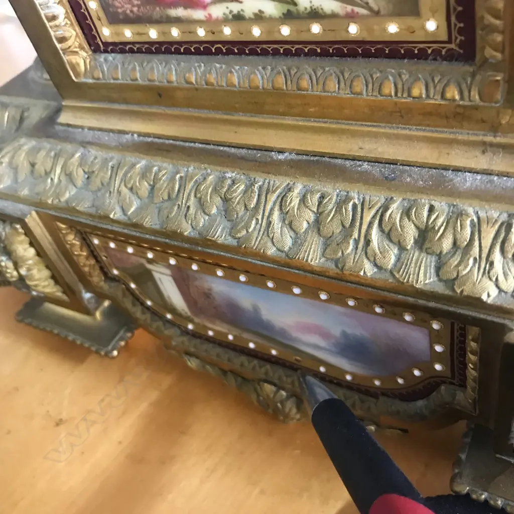 A good French 19thC ormolu and porcelain three-piece clock garniture Image 1++