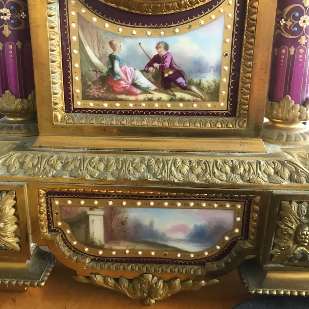 A good French 19thC ormolu and porcelain three-piece clock garniture Image 1++