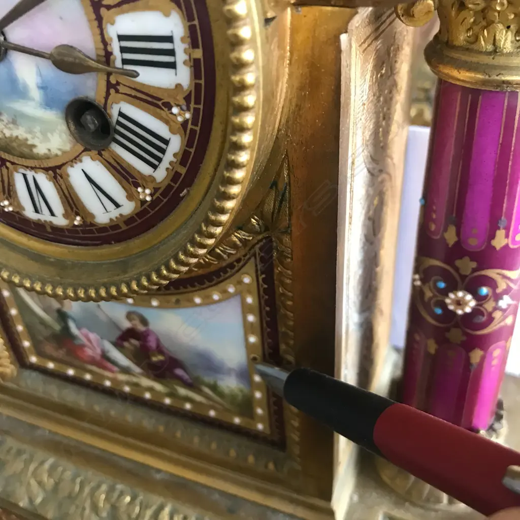 A good French 19thC ormolu and porcelain three-piece clock garniture Image 1++