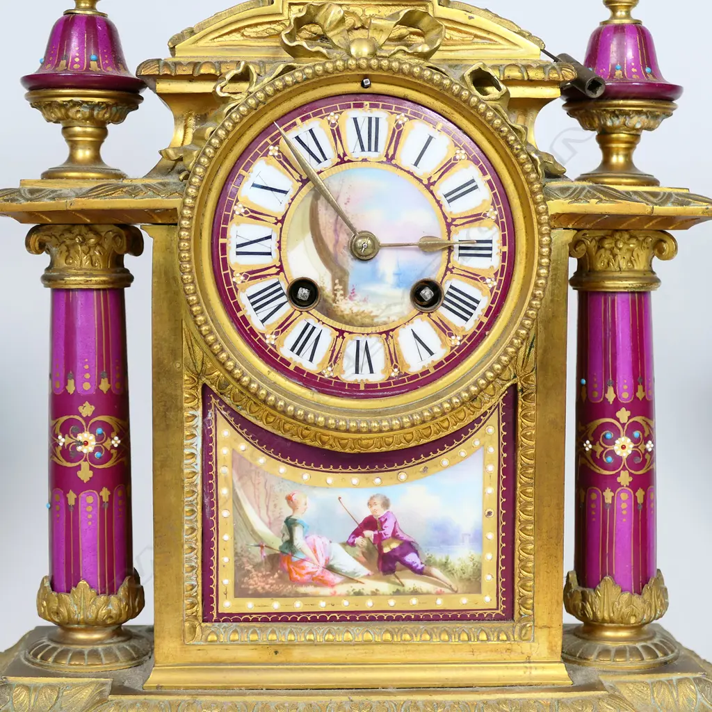 A good French 19thC ormolu and porcelain three-piece clock garniture Image 1++