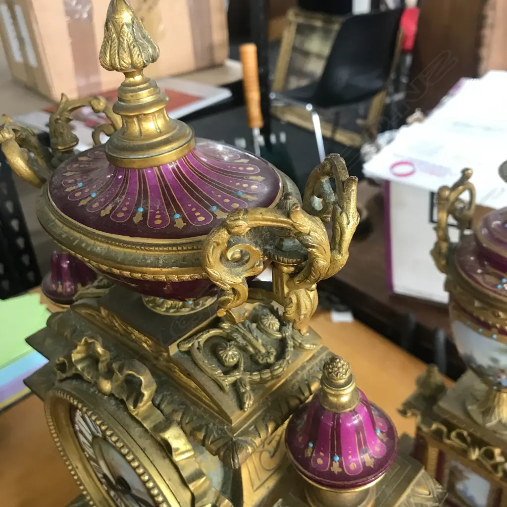 A good French 19thC ormolu and porcelain three-piece clock garniture Image 1++