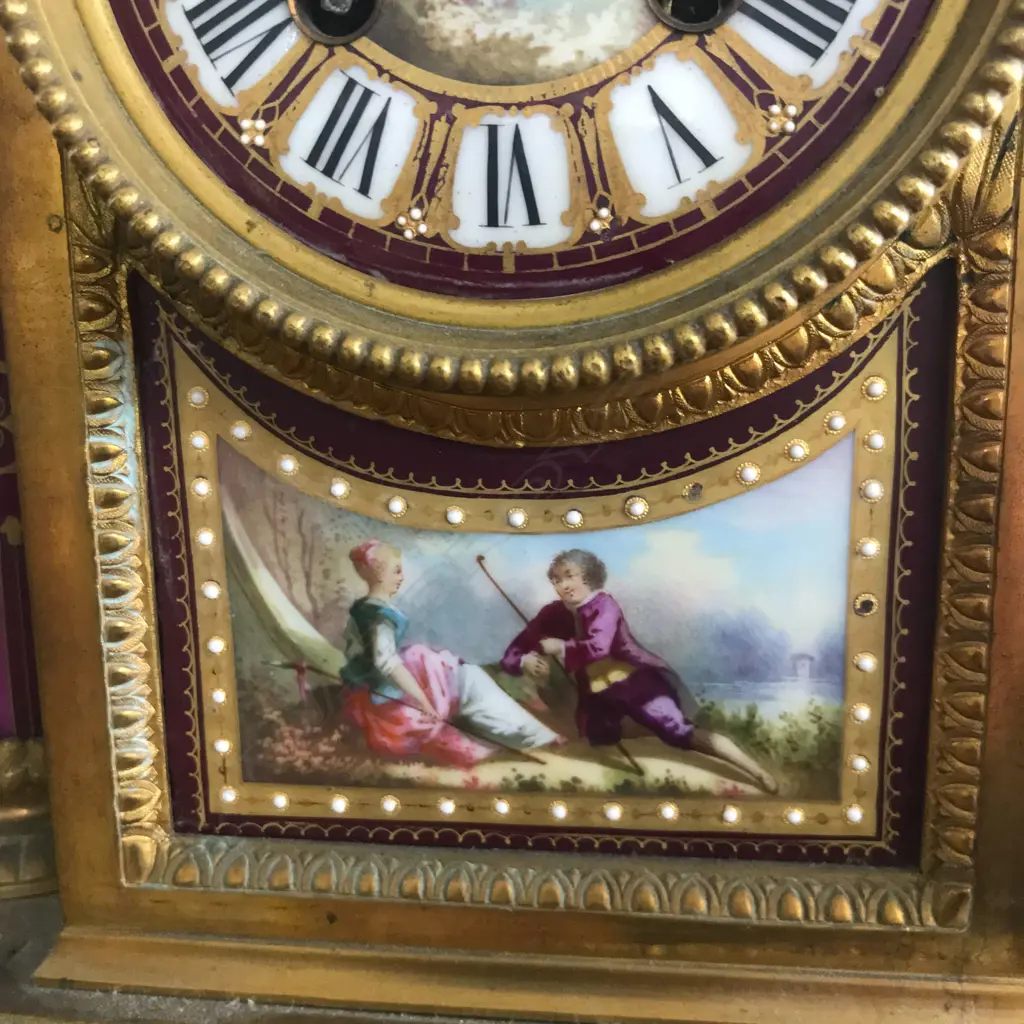 A good French 19thC ormolu and porcelain three-piece clock garniture Image 1++