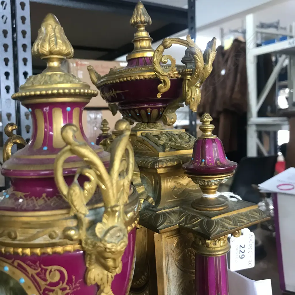 A good French 19thC ormolu and porcelain three-piece clock garniture Image 1++